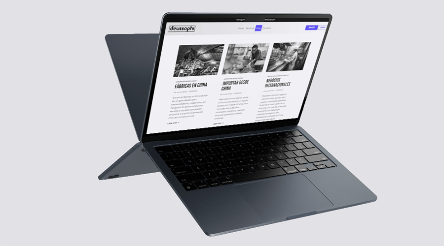 Computadora portátil mostrando una página web profesional con secciones informativas sobre negocios e importaciones, diseño limpio en blanco y negro con detalles en azul.